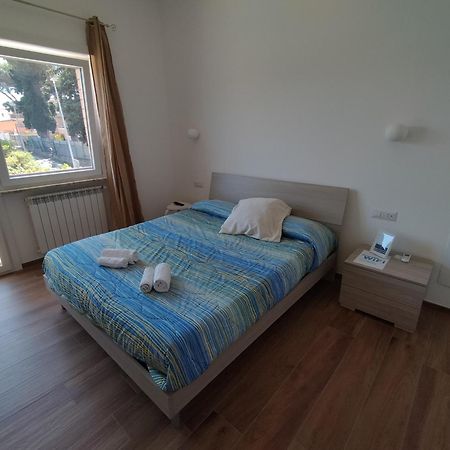 Апартаменты Viriamo House Roma Ачилия Номер фото