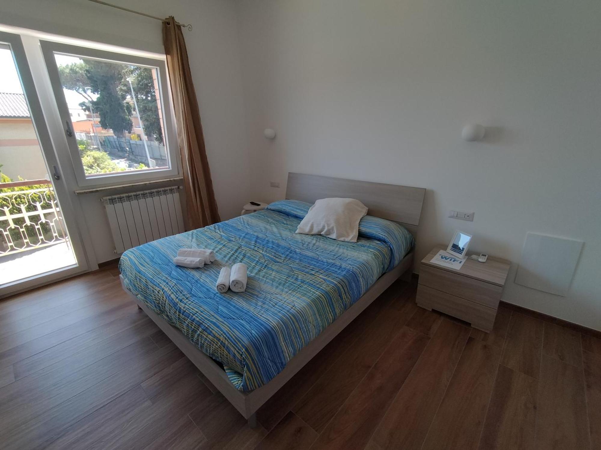 Апартаменты Viriamo House Roma Ачилия Номер фото